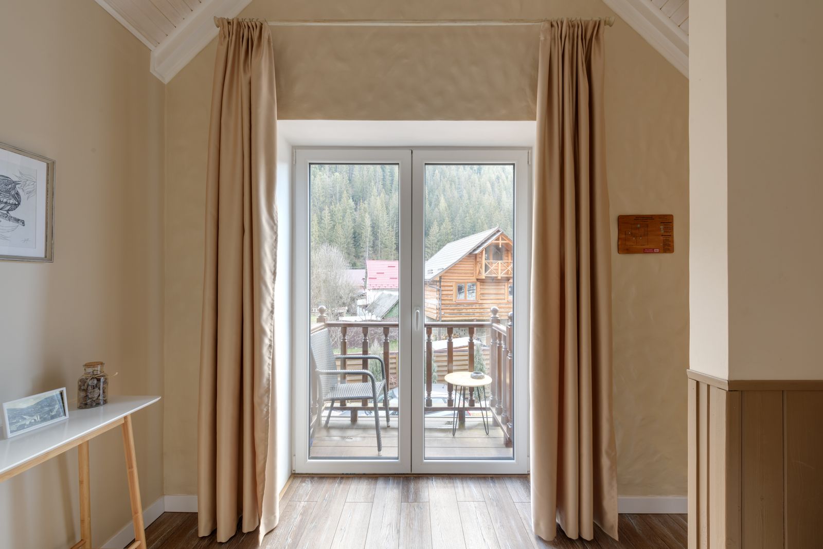 White French doors and tall windows opening onto a balcony.